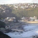 Rescue teams search for missing 70-year-old fisherman swept off rocks at Herolds Bay amid rough tides