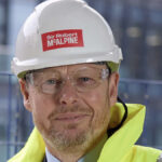 British Construction Giant Sir Robert McAlpine Attacks Net Zero Approach as Green Rules Push Steel Jobs and Manufacturing Capacity Out of the UK