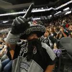 NBC camera captures two women behind Spurs bench in San Antonio as internet users identify OnlyFans creators and viral moment spreads across United States