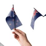 New Zealand is preparing a major shift in how it grants citizenship, introducing a formal test that will reshape the way migrants become naturalised citizens from 2027 onwards. The move marks one of the most significant updates to the country’s immigration and civic system in years. Instead of the current system, which relies largely on a declaration of understanding, applicants will now be expected to demonstrate real, measurable knowledge of the country’s laws, values, and democratic structure. A 20-Question Test at the Heart of the New Citizenship Process Under the new plan, migrants applying for citizenship by grant will sit an in-person, English-language multiple-choice exam. The test will contain 20 questions, and candidates must correctly answer at least 15 to pass. The exam is designed to check how well applicants understand the foundations of life in New Zealand, including its legal framework and civic expectations. Topics will include the Bill of Rights Act, human rights protections, voting rights, democratic principles, the structure of government, and basic criminal law concepts. It will also cover rules around entering and leaving the country, reflecting a broader focus on civic responsibility. From Declaration to Formal Assessment At present, citizenship applicants only need to sign a declaration stating they understand their rights and responsibilities. There is no formal testing process. The government now argues that this approach is too informal for something as important as national membership. The upcoming test is intended to turn what was once a personal acknowledgment into a structured assessment. Officials say this will ensure new citizens are not only willing to integrate but also fully aware of what citizenship actually means in practice. Government Says the Change Is About Shared Values Brooke van Velden has been one of the key voices behind the reform. She says the goal is to strengthen civic understanding and reinforce the principles that define New Zealand society. According to her, the test is not about exclusion but about clarity. She has emphasised that core values such as freedom of speech and equality before the law are central to the country’s identity. The government also believes that formalising knowledge expectations will help new citizens better participate in democratic life rather than simply reside in the country. Test Design Still Being Finalised Ahead of 2027 Launch The New Zealand Department of Internal Affairs is currently working on the detailed structure of the exam. This includes study materials, preparation guidelines, and the logistics of how the test will be administered. The rollout is expected in the second half of 2027, giving both applicants and immigration advisors time to adjust to the new requirements. Officials have indicated that support resources will be provided so applicants understand what is expected before sitting the exam. Impact and Consequences The introduction of a citizenship test is likely to reshape migration planning for thousands of applicants hoping to settle permanently in New Zealand. On one hand, supporters argue it could improve civic awareness and encourage stronger integration into society. On the other hand, critics of similar systems in other countries have warned that formal testing can create additional barriers for migrants with language or educational challenges. There is also the administrative impact: immigration advisors, legal experts, and training providers may see increased demand as applicants prepare for the exam. What’s Next? Over the next year, the government is expected to release sample questions and official study materials. This will give future applicants a clearer idea of what to expect before the test becomes mandatory. Parliamentary discussions and public feedback may also shape final adjustments to the format or pass requirements. As 2027 approaches, the focus will likely shift toward ensuring a smooth transition so applicants already in the system are not unfairly affected. Summary New Zealand is introducing a mandatory 20-question citizenship test starting in 2027. The exam will assess migrants’ understanding of laws, rights, and democratic systems, replacing the current declaration-based process. Officials, including Brooke van Velden, say the goal is to ensure new citizens have a clearer understanding of civic responsibilities. The New Zealand Department of Internal Affairs is now preparing the system ahead of rollout. Bulleted Takeaways New Zealand will introduce a citizenship test in the second half of 2027. Applicants must pass a 20-question multiple-choice exam in English. A minimum of 15 correct answers is required to pass. The test replaces the current citizenship declaration system. Topics include human rights, voting, government structure, and legal principles. Brooke van Velden says the reform strengthens civic understanding. The New Zealand Department of Internal Affairs is finalising exam structure and study materials. The policy aims to improve civic integration for new citizens. Critics and supporters are likely to debate accessibility and fairness. Full rollout preparation is underway ahead of the 2027 implementation date.
