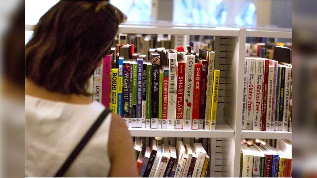 Reader browsing bookshelves for the best books on Korea–Japan relations, including history, diplomacy, colonialism, nationalism, and East Asian political studies