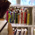 Reader browsing bookshelves for the best books on Korea–Japan relations, including history, diplomacy, colonialism, nationalism, and East Asian political studies