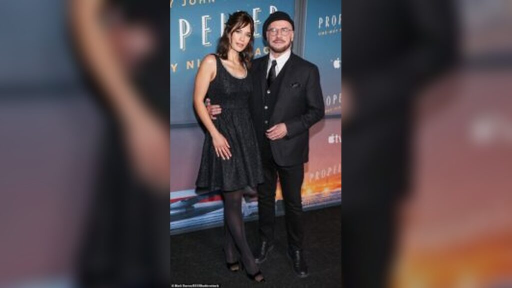 Divides Public Opinion as John Travolta Defends His Controversial Beret Style While Promoting Propeller One-Way Night Coach at LA Film Premiere in Los Angeles