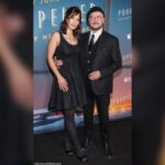 Divides Public Opinion as John Travolta Defends His Controversial Beret Style While Promoting Propeller One-Way Night Coach at LA Film Premiere in Los Angeles