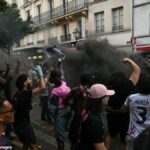 French Police Deploy Tear Gas and Arrest Dozens as PSG Supporters Ignite Violent Street Battles in Paris After Dramatic Champions League Victory Over Arsenal