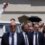 Pope Leo XIV is set to begin a major seven-day visit to Spain on Saturday, with his itinerary centering on immigration, social justice, and reconciliation at a time of heightened political tension under Prime Minister Pedro Sánchez. The trip comes as Spain faces deep divisions over migration policy, corruption scandals in government circles, and growing pressure from opposition forces challenging the current administration’s direction. Royal Welcome Opens the Visit in Madrid The Pope’s arrival will be marked by an official reception at the Royal Palace in Madrid, hosted by King Felipe VI and Queen Letizia of Spain. The ceremony is expected to set a formal tone for the visit, underscoring the Vatican’s continued diplomatic engagement with Spain, one of Europe’s historically Catholic nations. Massive Gatherings Planned at Bernabéu and City Centre Later on Saturday, a large prayer vigil is scheduled near the Santiago Bernabéu Stadium, where organizers anticipate up to 400,000 attendees. On Sunday, the scale is expected to increase significantly, with authorities preparing for around one million people to gather in Madrid’s city centre for a public Mass. The events are among the largest public religious gatherings Spain has seen in recent years, reflecting both the Pope’s global influence and continued interest in Catholic traditions despite declining church attendance in the country. Parliament Address and Landmark Blessing in Barcelona During the visit, Pope Leo XIV will also address Spain’s parliament, a politically sensitive engagement expected to touch on social inequality, migration, and national unity. In Barcelona, he will bless the newly completed tower of the Sagrada Familia Basilica, which now holds the distinction of being the tallest church structure in the world. The symbolic act links the Pope’s visit to one of Spain’s most iconic architectural and religious landmarks. Meeting Victims of Clergy Sexual Abuse The Vatican confirmed that the Pope will meet victims of sexual abuse committed by Catholic clergy during his time in Spain. According to a 2023 report by Spain’s national ombudsman, an estimated 200,000 minors may have suffered abuse since 1940. In March, the Spanish government under Sánchez and the Catholic Church reached an agreement to establish compensation mechanisms for survivors, following years of criticism over institutional silence and delays. Canary Islands: Migration and Memorials at Europe’s Edge Before arriving on the mainland, the Pope will travel to the Canary Islands on Thursday and Friday, where he is expected to meet migrants and organizations supporting them. He will also join Prime Minister Sánchez in honoring thousands of people who have died attempting the dangerous sea crossing from Africa to Europe. The Canary Islands have become the primary entry point for irregular migration into Spain, often involving perilous journeys across the Atlantic. The International Organization for Migration estimates that 1,172 migrants died or went missing on the route in 2025, only slightly below the 1,215 recorded the previous year. Political Pressure and a Divided Spain Spain’s relatively open migration stance under Sánchez contrasts with hardline opposition from the conservative Popular Party and the far-right Vox movement, which campaigns under the slogan of defending “Spain, the family and life.” At the same time, Sánchez is facing mounting domestic pressure due to corruption allegations involving figures close to him, including relatives and former senior officials. The cases have added political strain despite his repeated refusal to resign. He continues to insist that his minority coalition will complete its mandate through the next scheduled elections in 2027. Security, Media Attention, and a Highly Charged Visit Officials describe Spain as a “polarised country” during the Pope’s visit, with concerns that different political actors may attempt to shape or exploit the narrative surrounding the trip. Around 15,000 members of Spain’s National Police and Guardia Civil are being deployed, alongside local forces, to secure events across multiple cities. More than 4,000 journalists from 80 countries have also been accredited, highlighting the global attention focused on the visit. First EU Trip Outside Italy and a Symbolic Moment for the Papacy This marks Pope Leo XIV’s first visit to a European Union country outside Italy and the first papal state visit to Spain since Pope Benedict XVI’s trip in 2010. His predecessor, Pope Francis, largely bypassed many of Europe’s traditional Catholic strongholds, including Spain, where religious participation has continued to decline sharply in recent decades.